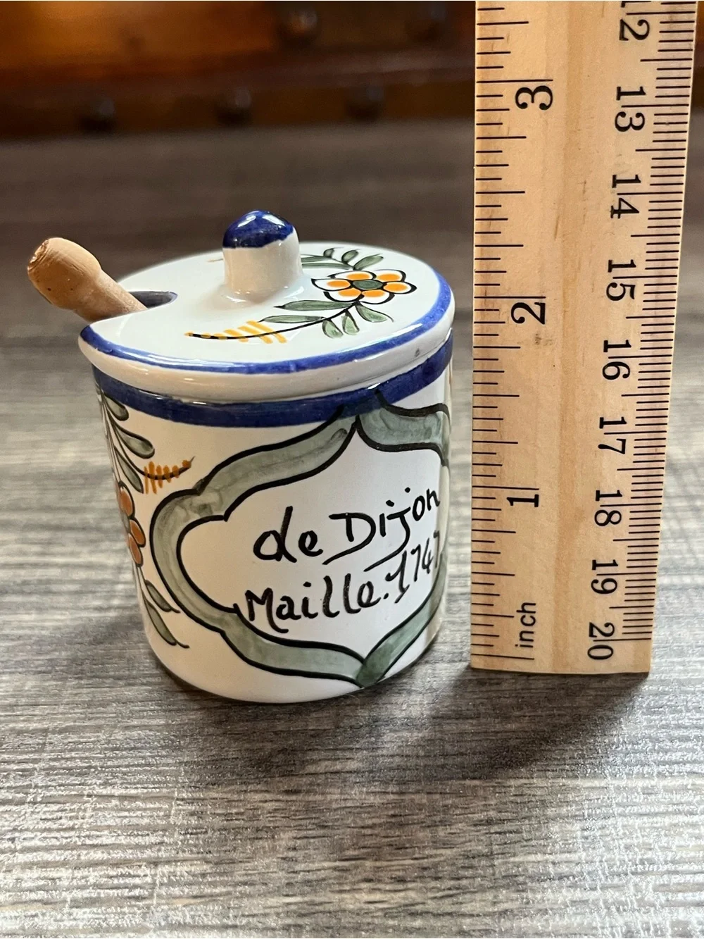 Small homemade French hand painted mustard jar with wooden spoon. Ceramic